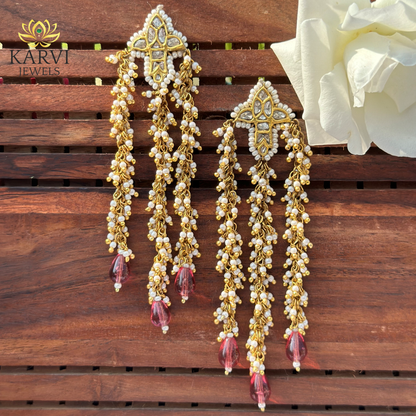- Dazzling Dangles: 18K Gold Polki Earrings with Uncut Diamonds and Pearls